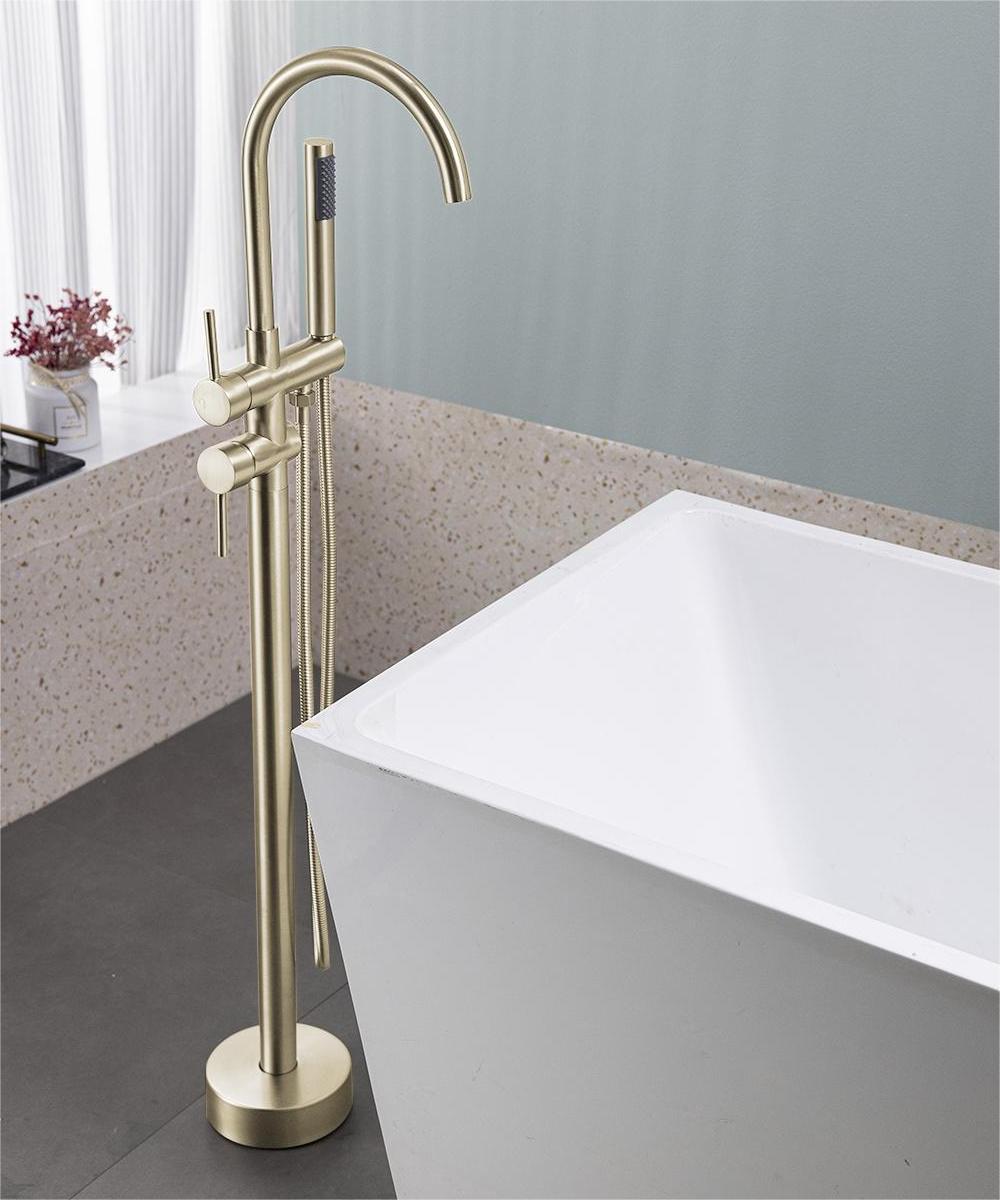 English Elm Floor Mount freestanding bathtub faucet with matte black finish, high-flow single-handle tub filler with handheld shower and 360° swivel spout, durable stainless steel and brass construction Brushed Gold T3177P277534