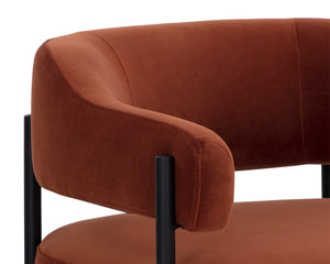 Sunpan Lola Lounge Chair - Contemporary Comfort with Elegant Curves and Matte Black Iron Frame Design Meg Rust