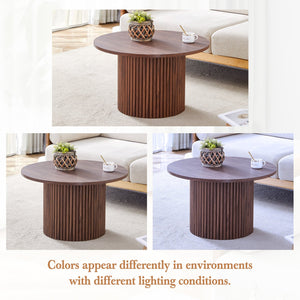 English Elm A modern circular coffee table Walnut MDF with hidden storage, cylindrical textured legs, polished edge detail, 27.5" diameter W1512P410543