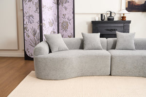 English Elm Curved Boneless Sofa modular 110" sectional with high-density foam & spring core, kid‑friendly curves, no assembly required for easy moving and cozy lounging Grey W2231S00007