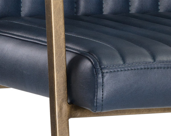 Sunpan Homer Dining Armchair - Stylish Industrial Design with Antique Brass Frame and Bold Channel Stitching Bravo Admiral