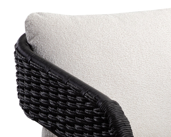 Sunpan Pylos Dining Armchair - Stylish Outdoor Seating with Durable Wicker and Soft Performance Fabric Cushion Black / Louis Cream