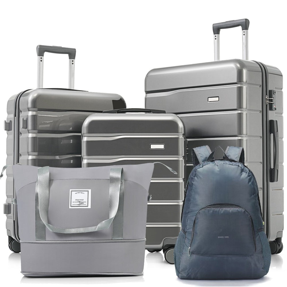 English Elm Luggage 4 Piece Abs Hard Shell Set with Spinner Wheels and Weekender Travel Bag N726P185031D
