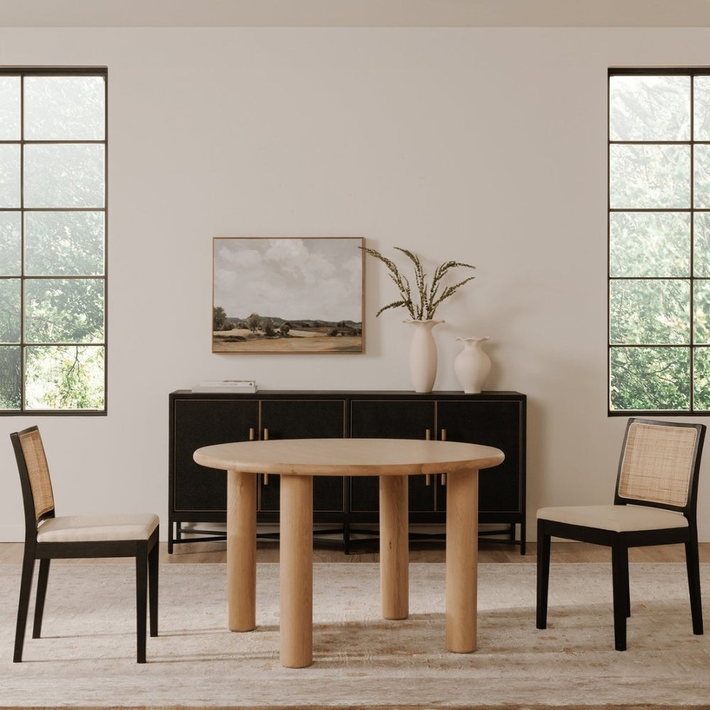 English Elm Milo Round Oak Dining Table Seats Four with Warm Natural Grain and Clean Lined Base B2769S00002