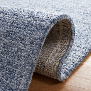 Safavieh Abstract 151 Hand Tufted Contemporary Rug Ivory / Navy ABT151N-5