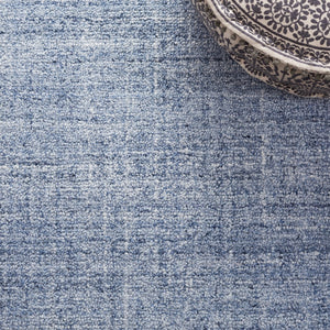 Safavieh Abstract 151 Hand Tufted Contemporary Rug Ivory / Navy ABT151N-5