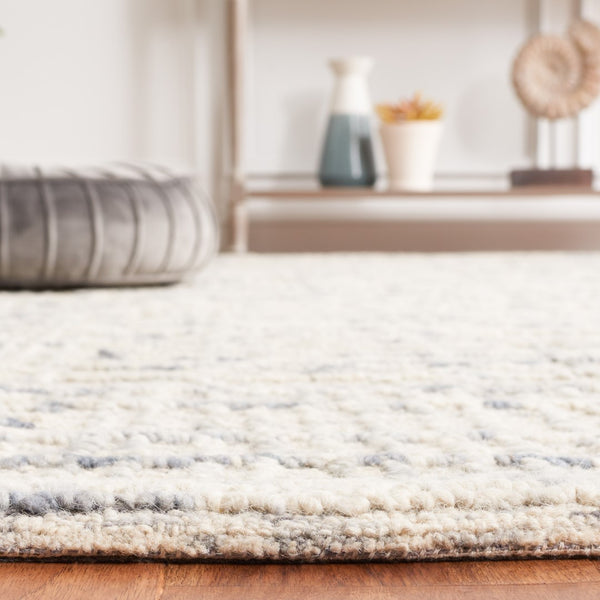 Safavieh Abstract 275 Hand Tufted Contemporary Rug Light Blue / Ivory 5' x 8'