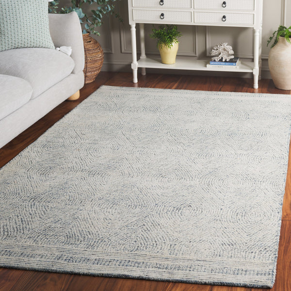 Safavieh Abstract Hand-Tufted Wool Oval Rug In Ivory And Blue — Scandinavian Abstract Motif, Low-Profile Durable Texture 6'-0" x 8'-0" ABT340M-68OV