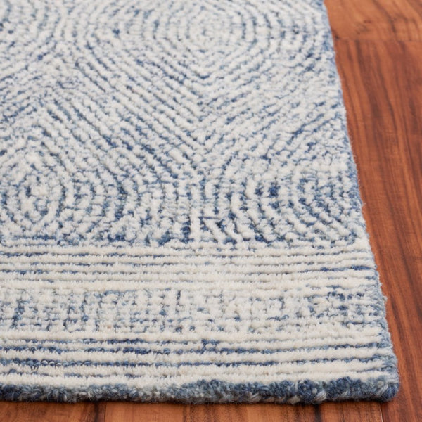 Safavieh Abstract Hand Tufted Wool Rug Ivory Navy Minimal Pile for Living or Dining Spaces ABT340N-9
