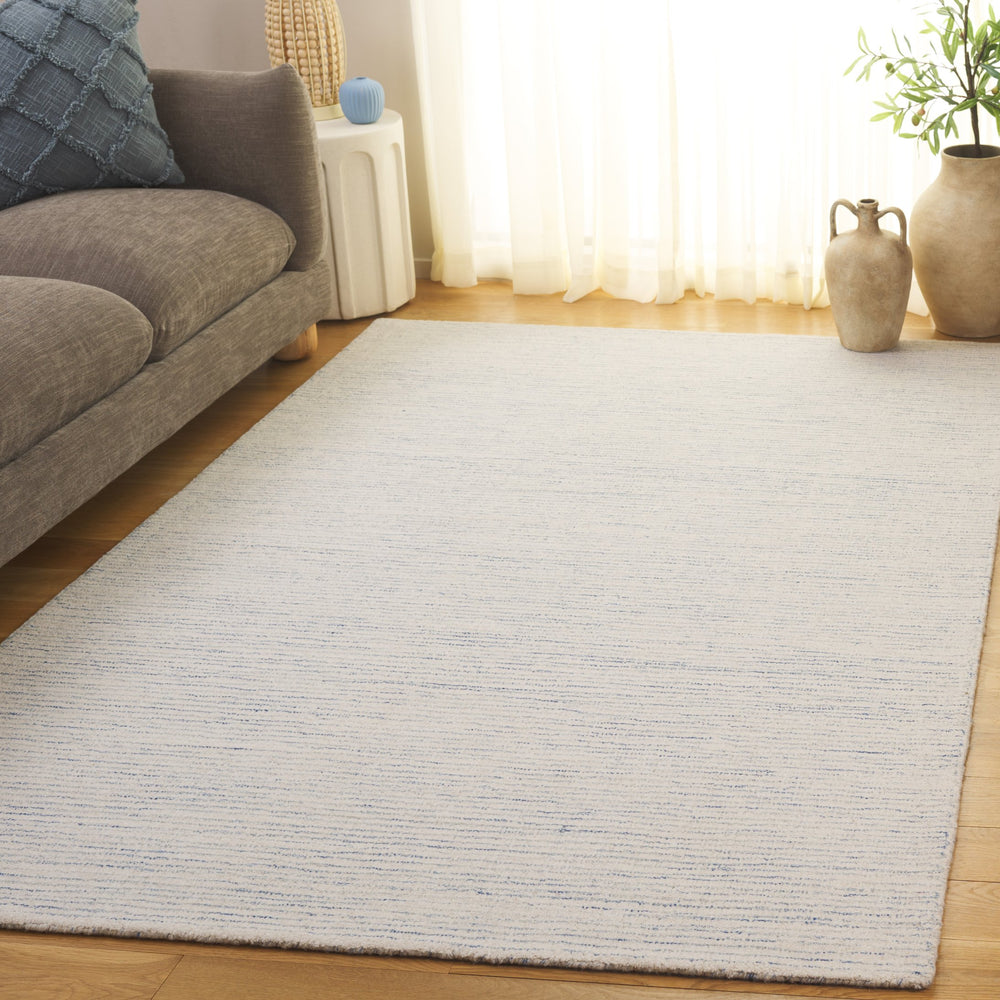 Safavieh Abstract Ivory Hand-Tufted Wool-Cotton Rug With Subtle Blue Striations — Low-Pile, Artisan Crafted Elegance 5'-0" x 8'-0" ABT361A-5