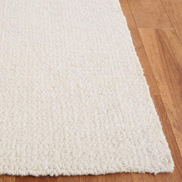 Safavieh Abstract 494 Hand Tufted Abstract Rug Ivory ABT494A-5