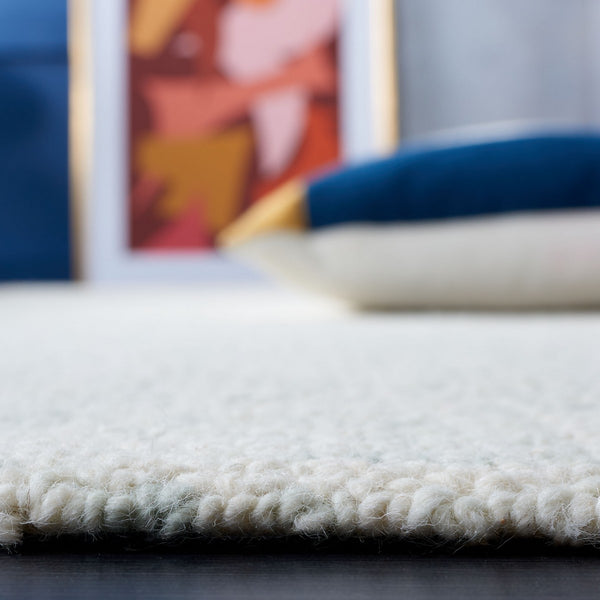 Safavieh Abstract 495 Hand Tufted Abstract Rug Light Sage / Ivory ABT495W-8