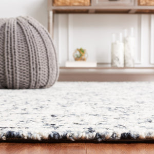 Safavieh Abstract 495 Hand Tufted Abstract Rug Black / Ivory ABT495Z-8