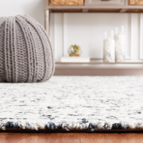 Safavieh Abstract 495 Hand Tufted Abstract Rug Black / Ivory ABT495Z-8