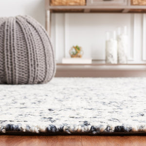 Safavieh Abstract 495 Hand Tufted Abstract Rug Black / Ivory ABT495Z-5