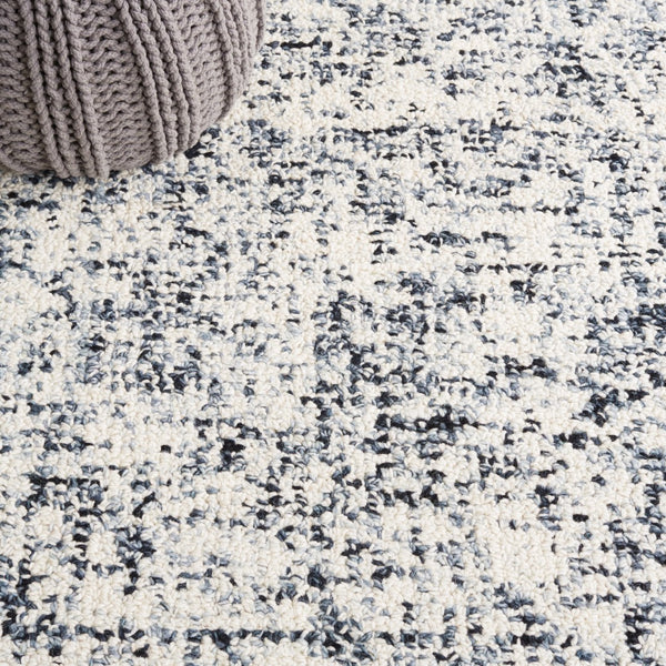 Safavieh Abstract 495 Hand Tufted Abstract Rug Black / Ivory ABT495Z-5