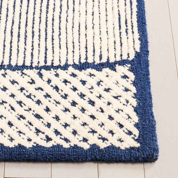 Safavieh Abstract Handcrafted Area Rug - Luxurious Wool Pile, Modern Design For Elegant Home Decor And Comfort Ivory ,Navy Wool Pile Abt776a-6