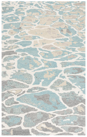 Safavieh Abstract Area Rug - Stunning Hand-tufted Design Enhances Any Space With Ocean-inspired Elegance Blue ,Ivory 80% Wool % 20% Cotton Abt975m-9