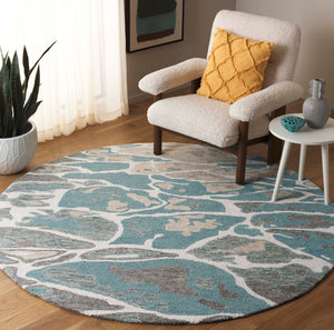 Safavieh Abstract Area Rug - Stunning Hand-tufted Design Enhances Any Space With Ocean-inspired Elegance Blue ,Ivory 80% Wool % 20% Cotton Abt975m-9