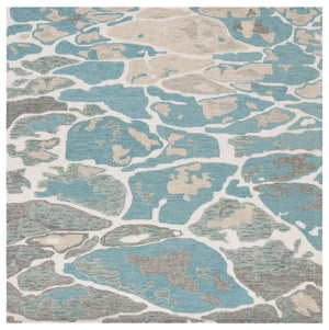 Safavieh Abstract Area Rug - Stunning Hand-tufted Design Enhances Any Space With Ocean-inspired Elegance Blue ,Ivory 80% Wool % 20% Cotton Abt975m-9