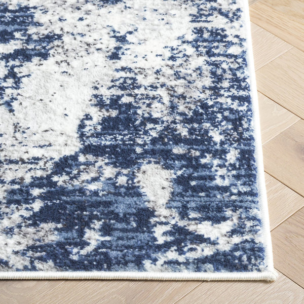 Safavieh Amelia Contemporary Oversized Area Rug In Ivory And Navy - Elevate Your Home Décor With Style Ivory ,Navy 75% Polypropylene 25% Shrink Polyester Ala705a-212