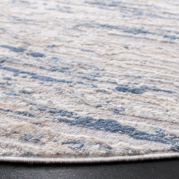 Safavieh Amelia 768 Power Loomed Contemporary Rug Ivory / Blue 75% Polypropylene 25% Shrink Polyester