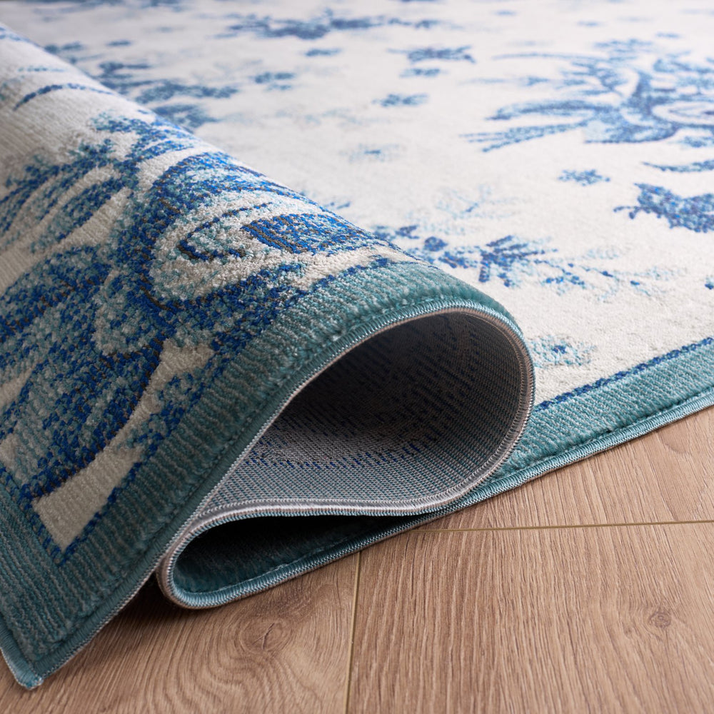 Safavieh Aria Ivory And Blue Floral Area Rug — Low-Profile Power-Loomed Turkish Design, Durable Softlux Finish 5'-0" x 6'-7" ARA125B-5