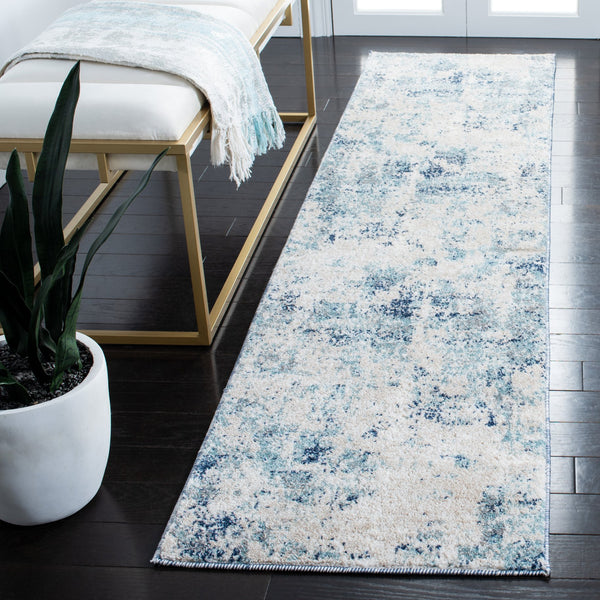 Safavieh Aston Contemporary Area Rug - Luxurious Soft Pile, Power-loomed Elegance For Modern Living Spaces Ivory ,Blue 80% Polypropylene,20% Polyester Asn710m-10