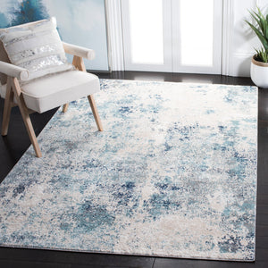 Safavieh Aston Contemporary Area Rug - Luxurious Soft Pile, Power-loomed Elegance For Modern Living Spaces Ivory ,Blue 80% Polypropylene,20% Polyester Asn710m-10