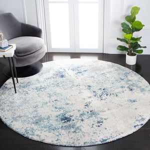 Safavieh Aston Contemporary Area Rug - Luxurious Soft Pile, Power-loomed Elegance For Modern Living Spaces Ivory ,Blue 80% Polypropylene,20% Polyester Asn710m-10