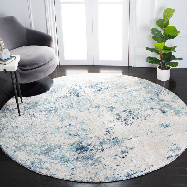 Safavieh Aston Contemporary Area Rug - Luxurious Soft Pile, Power-loomed Elegance For Modern Living Spaces Ivory ,Blue 80% Polypropylene,20% Polyester Asn710m-10