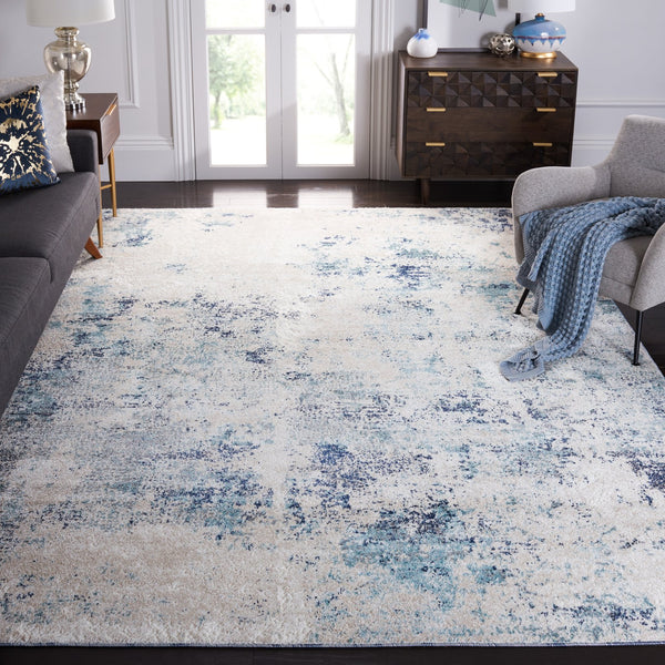 Safavieh Aston Contemporary Area Rug - Luxurious Soft Pile, Power-loomed Elegance For Modern Living Spaces Ivory ,Blue 80% Polypropylene,20% Polyester Asn710m-10