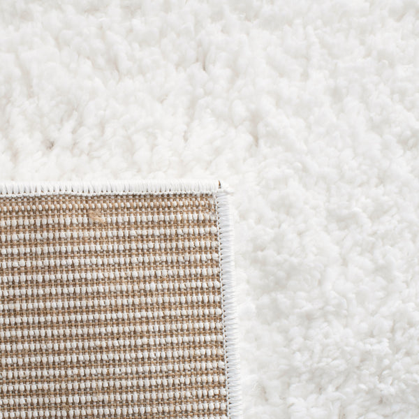 Safavieh August Luxurious Shag Area Rug - Sumptuous Softness & Modern Elegance For Your Cozy Living Space White 65% Polypropylene + 35% Jute Aug900a-10r