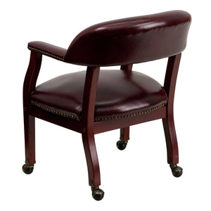 English Elm Sarah Luxurious Conference Chair with Brass Nailhead Trim, Solid Wood Frame & Smooth Mobility Oxblood Vinyl B-Z100-OXBLOOD-GG