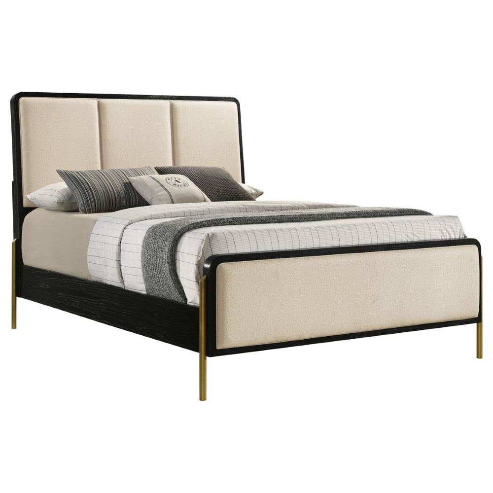 English Elm Benson Eastern King Panel Bed with Cream Upholstery and Aged Brass Leg Accents Black B062S01913