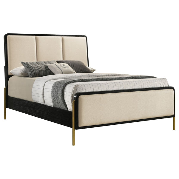 English Elm Benson Eastern King Panel Bed with Cream Upholstery and Aged Brass Leg Accents Black B062S01913