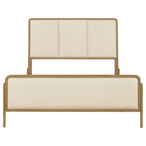 English Elm Benson Eastern King Panel Bed with Cream Upholstery and Aged Brass Leg Accents Sand B062S01914