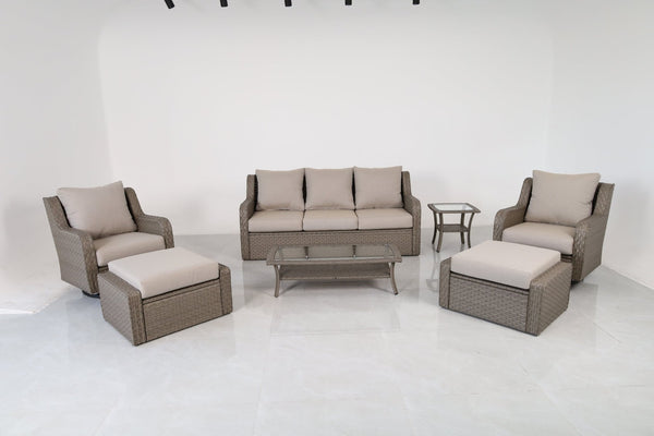 English Elm Premium 7 Piece Rattan Patio Set with Swivel Chairs Ottomans and Glass Top Tables B120S00279