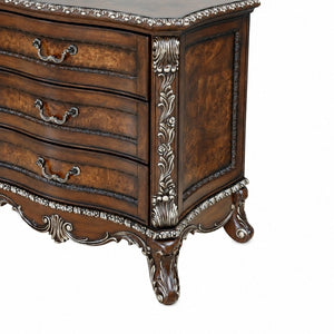English Elm Devany 3-drawer Antique Oak Bedside Chest with Carved Scrollwork and Champagne Accents B2770P520678