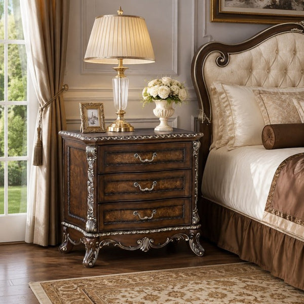 English Elm Devany 3-drawer Antique Oak Bedside Chest with Carved Scrollwork and Champagne Accents B2770P520678