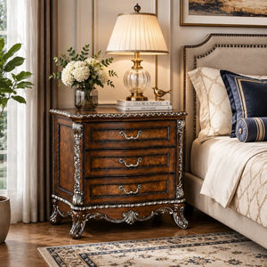 English Elm Devany 3-drawer Antique Oak Bedside Chest with Carved Scrollwork and Champagne Accents B2770P520678