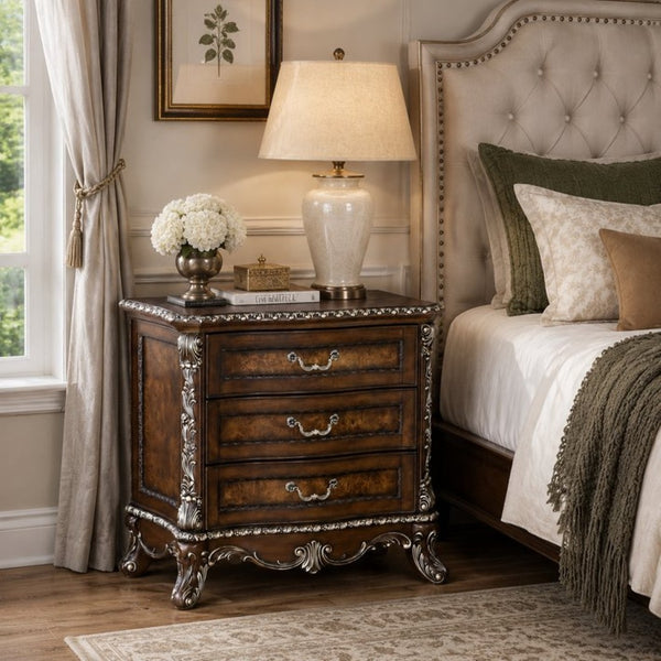 English Elm Devany 3-drawer Antique Oak Bedside Chest with Carved Scrollwork and Champagne Accents B2770P520678