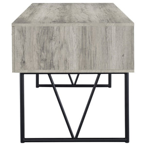 English Elm Sonoma Four Drawer Writing Desk with Metal Legs and Weathered Industrial Rustic Finish Driftwood B2777P535912