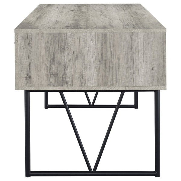 English Elm Sonoma Four Drawer Writing Desk with Metal Legs and Weathered Industrial Rustic Finish Driftwood B2777P535912