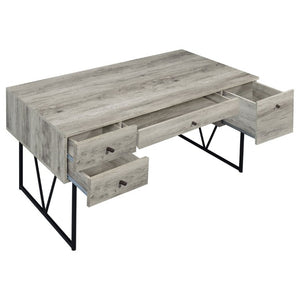 English Elm Sonoma Four Drawer Writing Desk with Metal Legs and Weathered Industrial Rustic Finish Driftwood B2777P535912