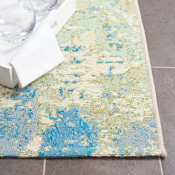 Safavieh Barbados Area Rug - Elegant Botanical Design In Blue And Ivory For Indoor & Outdoor Spaces Blue ,Ivory 76% Polypropylene,23% Polyester,1% Backing Material Bar594m-9