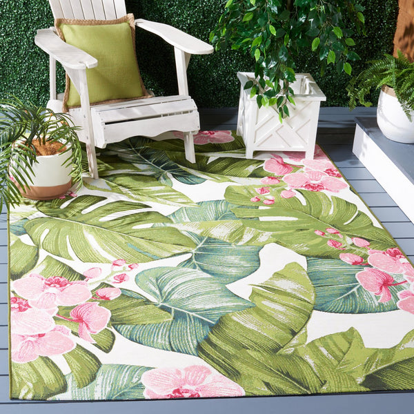 Safavieh Barbados Exquisite Tropical Leaf Area Rug - Elegant Indoor/Outdoor Decor With Durable Craftsmanship Green ,Pink 76% Polypropylene,23% Polyester,1% Backing Material Bar596y-9