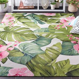 Safavieh Barbados Exquisite Tropical Leaf Area Rug - Elegant Indoor/Outdoor Decor With Durable Craftsmanship Green ,Pink 76% Polypropylene,23% Polyester,1% Backing Material Bar596y-9