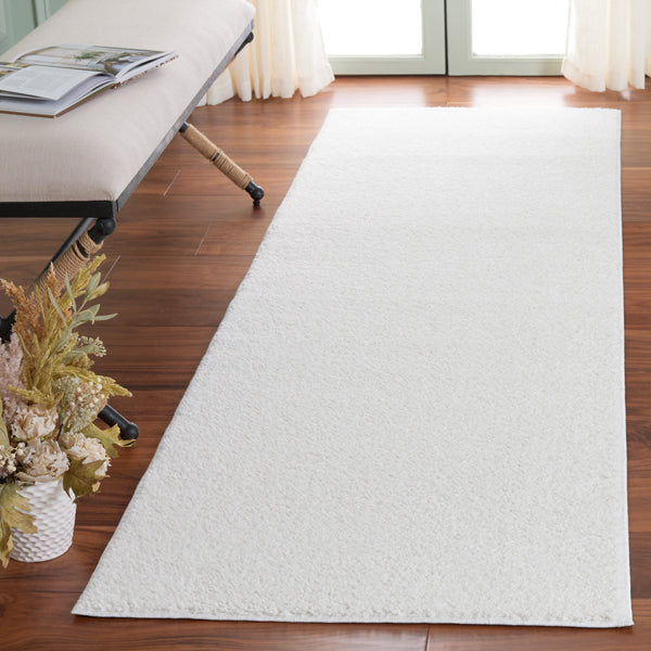 Safavieh Boucle Stylish Power Loomed Rug In Elegant Ivory - Durable, Washable, And Slip-resistant Design Ivory Polyester Bcl100a-8