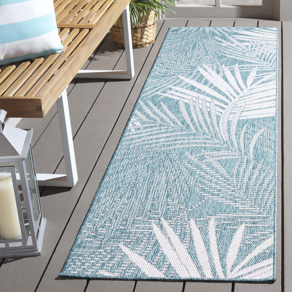 Safavieh Beach House Elegant Indoor/Outdoor Area Rug - Stylish, Durable, And Perfect For Coastal Living Spaces Aqua ,Ivory 85% Polypropylene,15% Polyester Bhs264j-7r